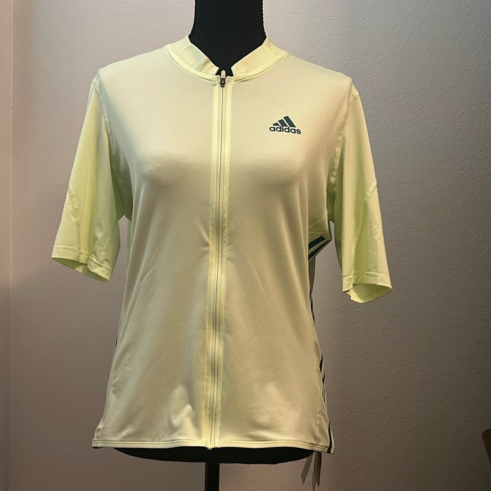 Adidas zip short sleeve zip front biking top. 3 back pkts, high low hem NWT